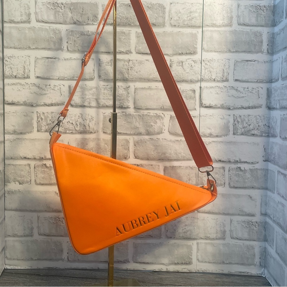 Aubrey Jai Orange Triangle Crossbody Bag. adjustable strap. Preowned. See pics: